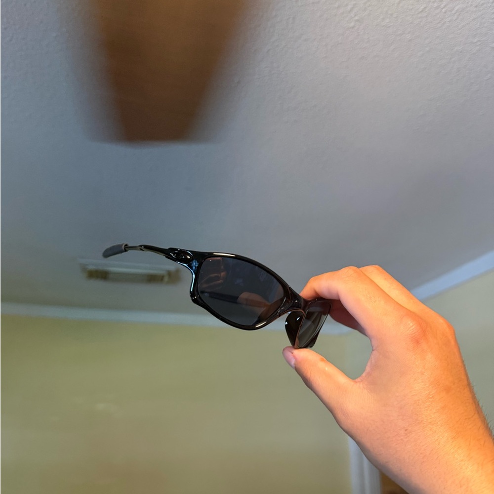 Black Sleek Sunglasses - Glossy Frame Oakley Oakleys